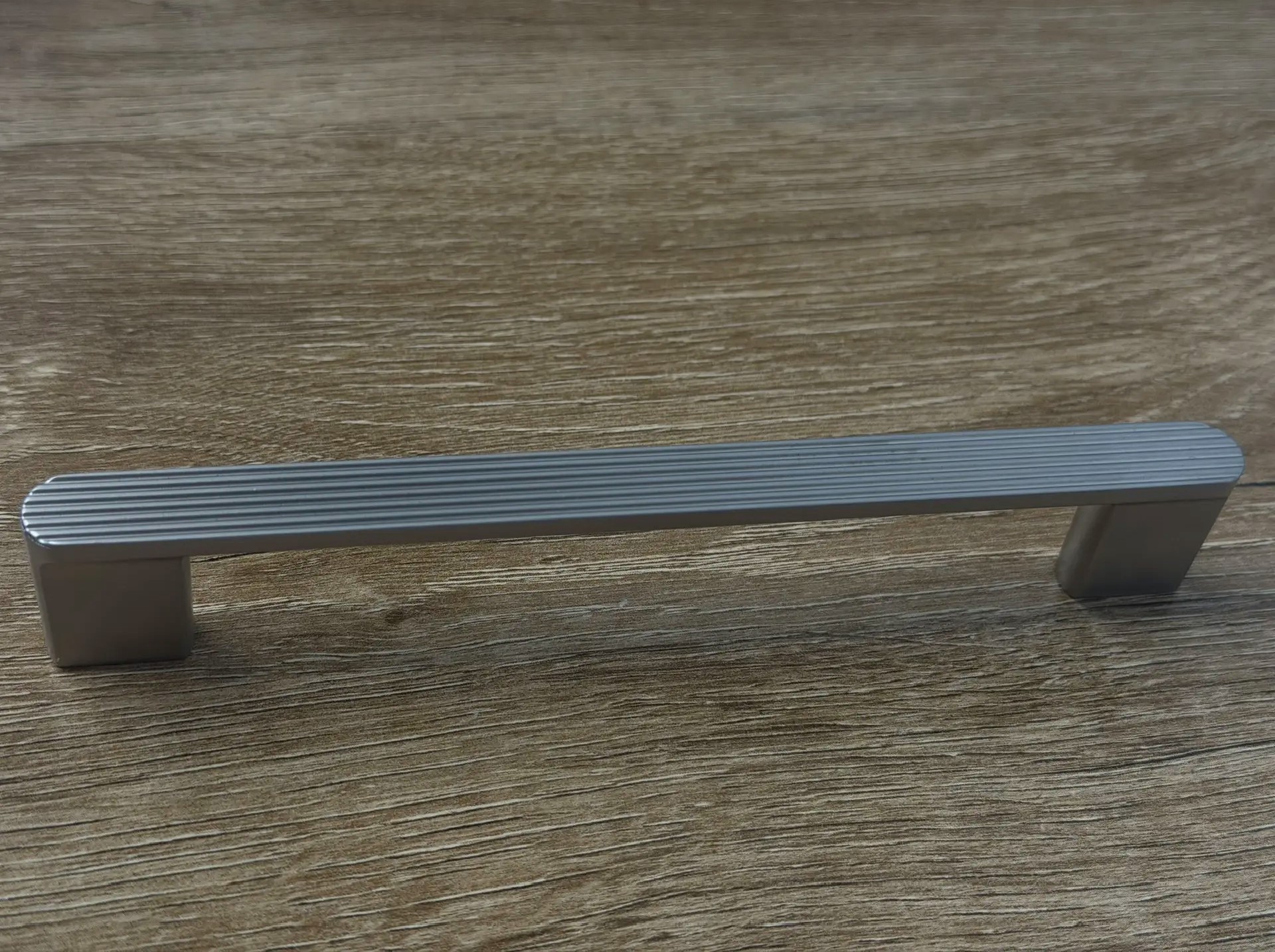 S 227.128.000 Ручка-скоба 0049230  Ni жемчужный Винт М4*22 - 2 шт.